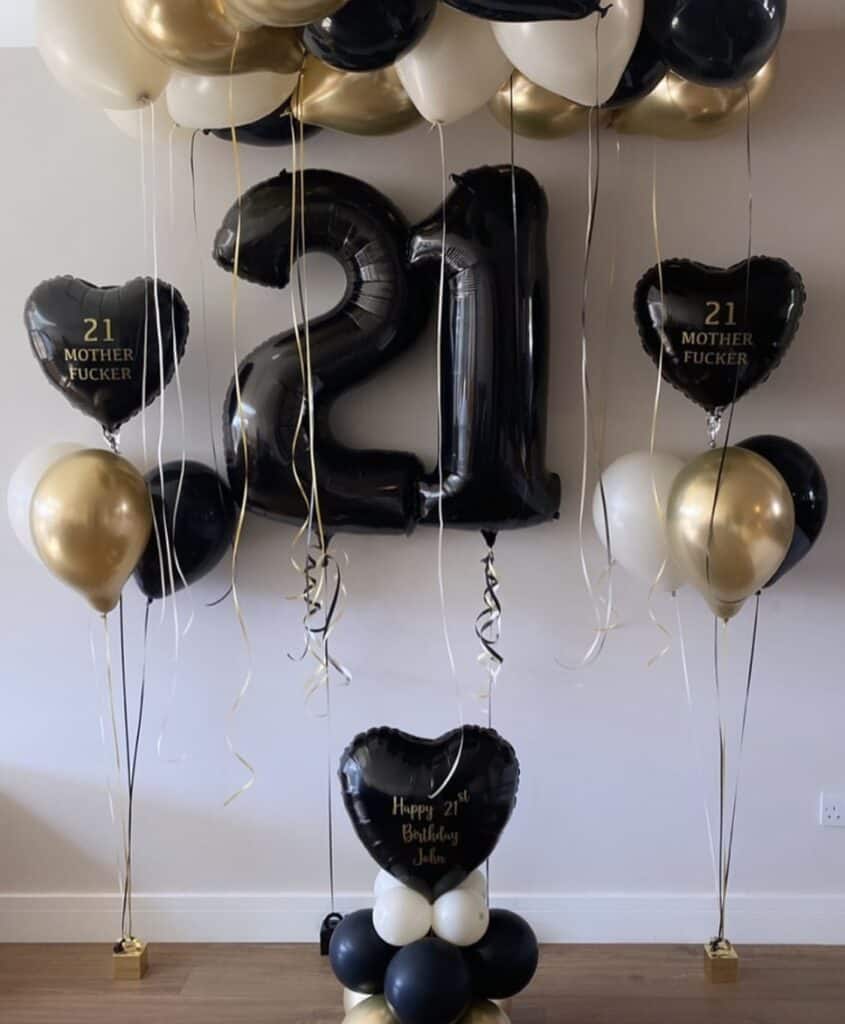 black and gold balloons for birthday