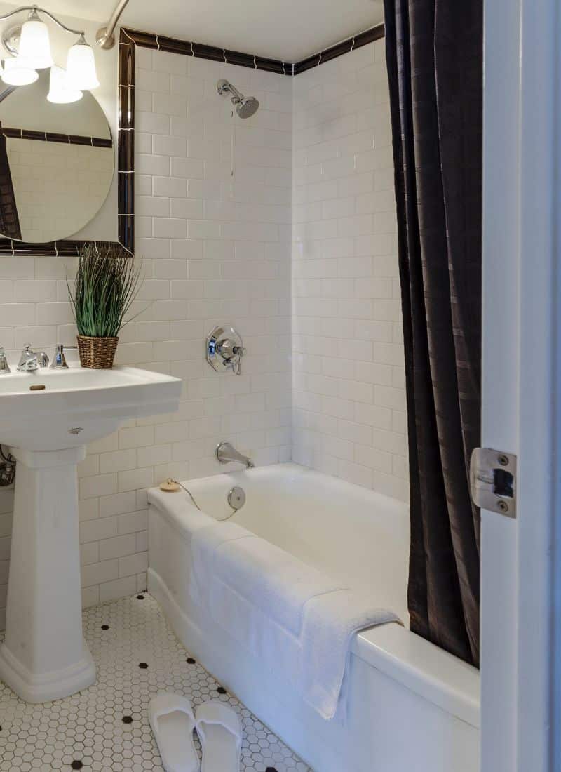 Does Shower Curtain Go Inside or Outside Tub? Settling the Debate on Proper Shower Curtain Placement