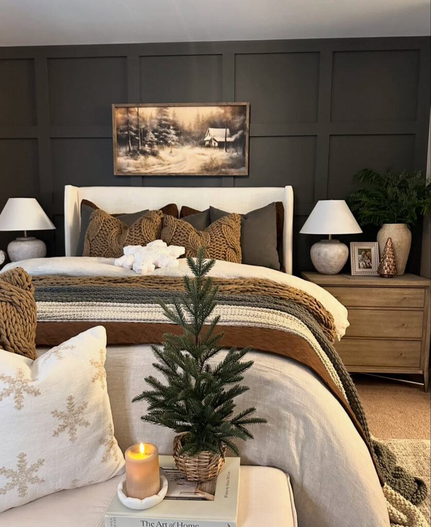 Dark-paneled room with marquee sign, lanterns, and packed tree—maximalist Christmas decoration ideas for bedroom. Bold tartans blanket the bed.