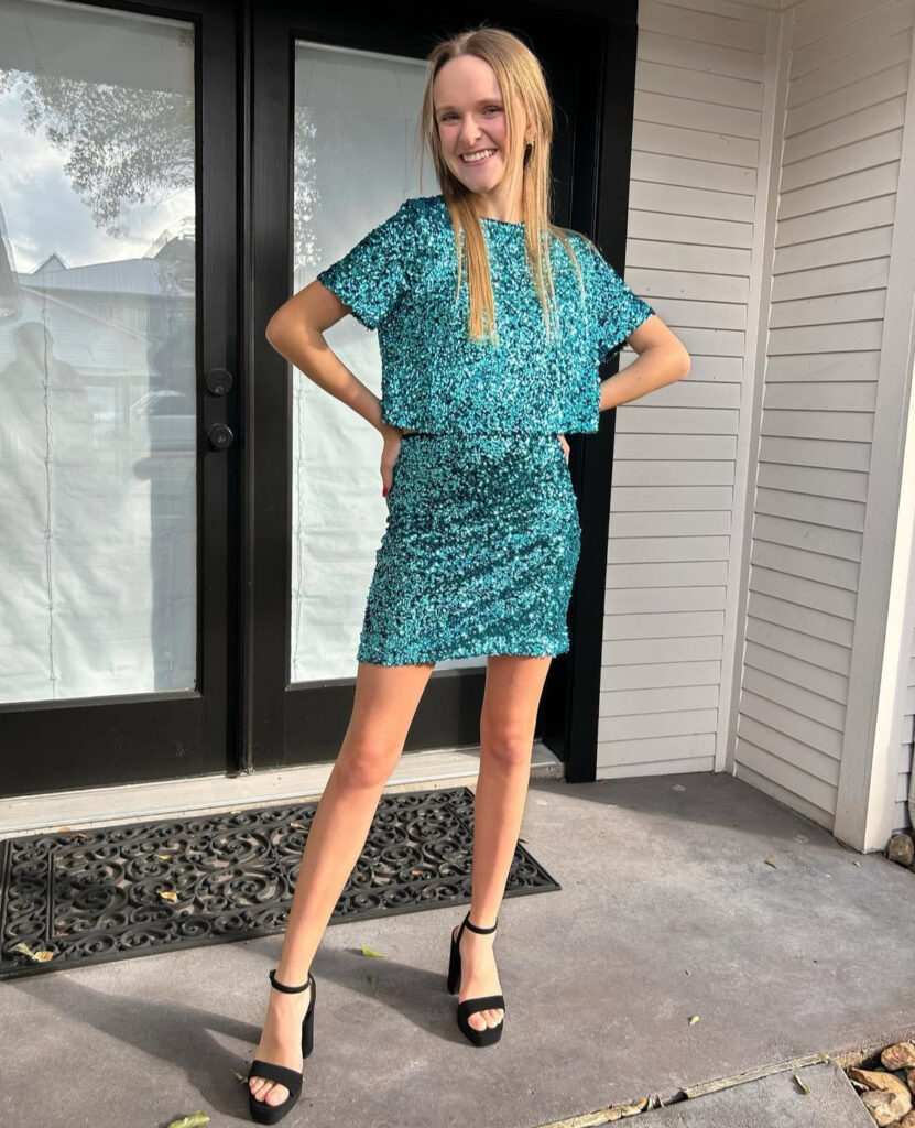 Sea-green sequin crop and mini set with platform sandals; bright, cute new years outfits.