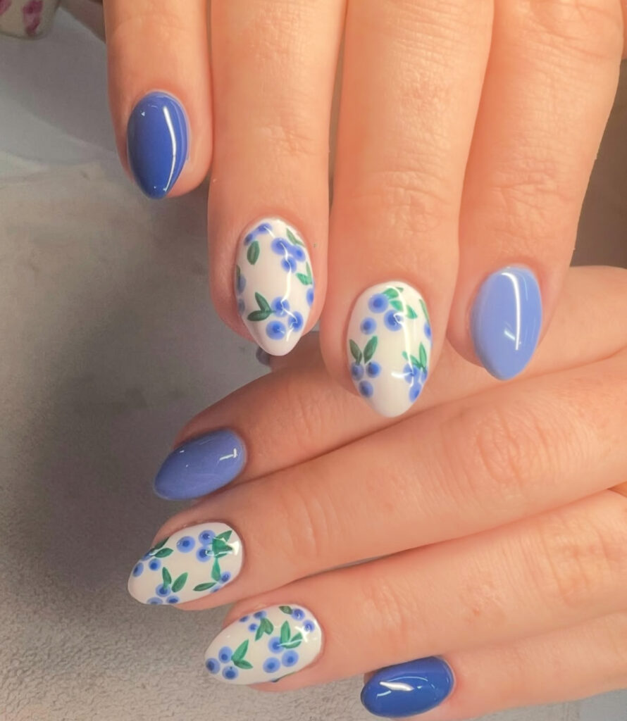 Blueberry-inspired floral blue nail design