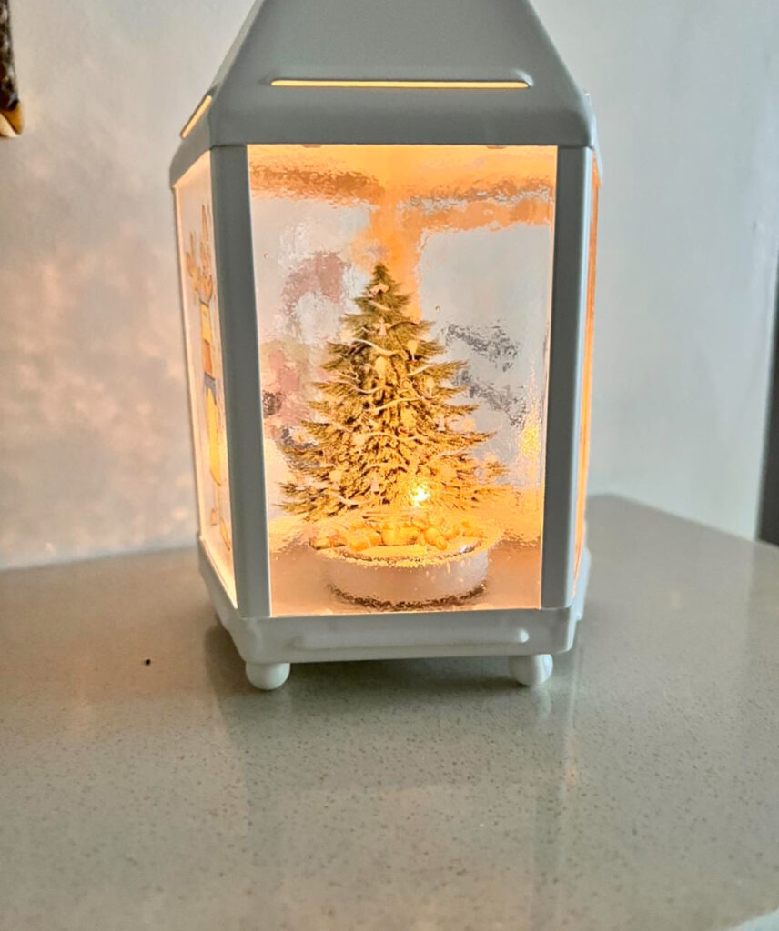 DIY Rustic Christmas lanterns with frosted greenery