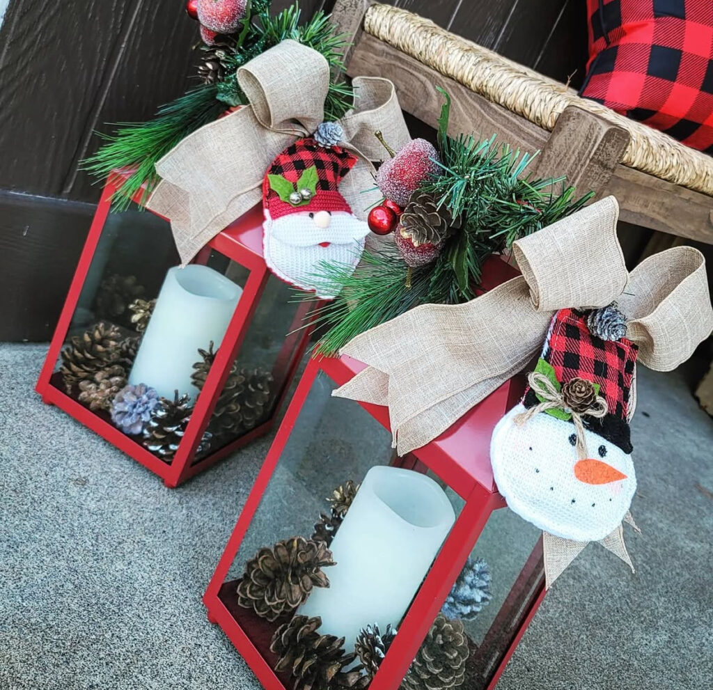 Pair of cozy cabin lanterns on a snowy porch step
