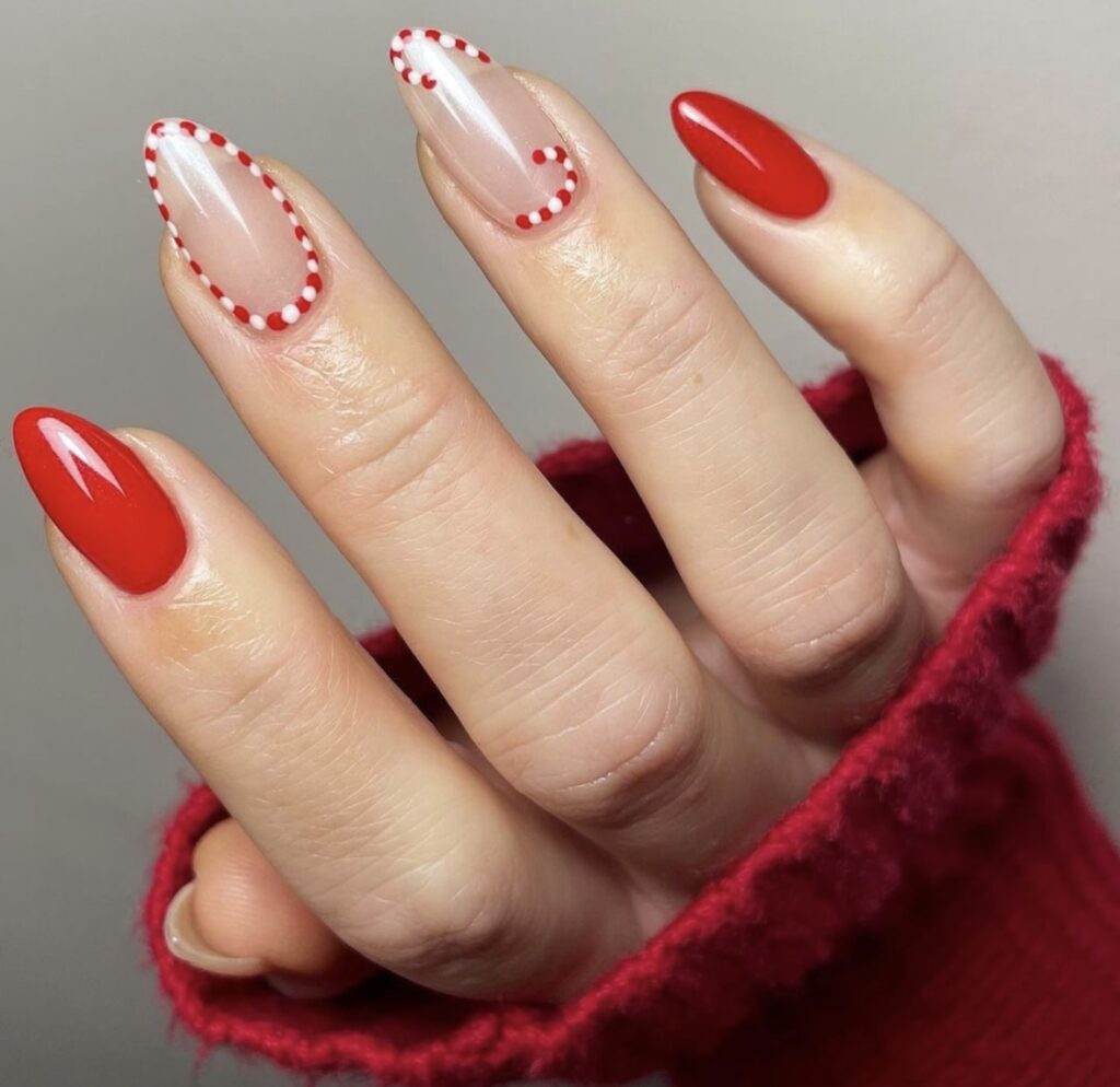Minimal dotted outline peppermint nail design