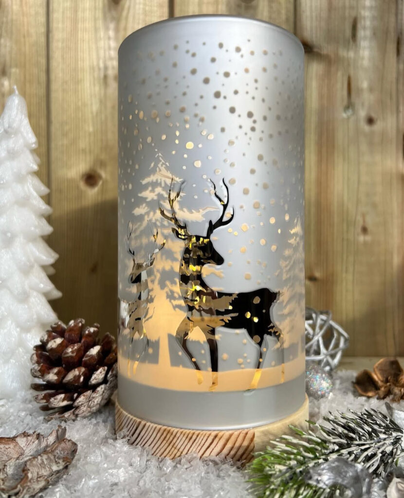 Frosted reindeer lantern with soft warm glow