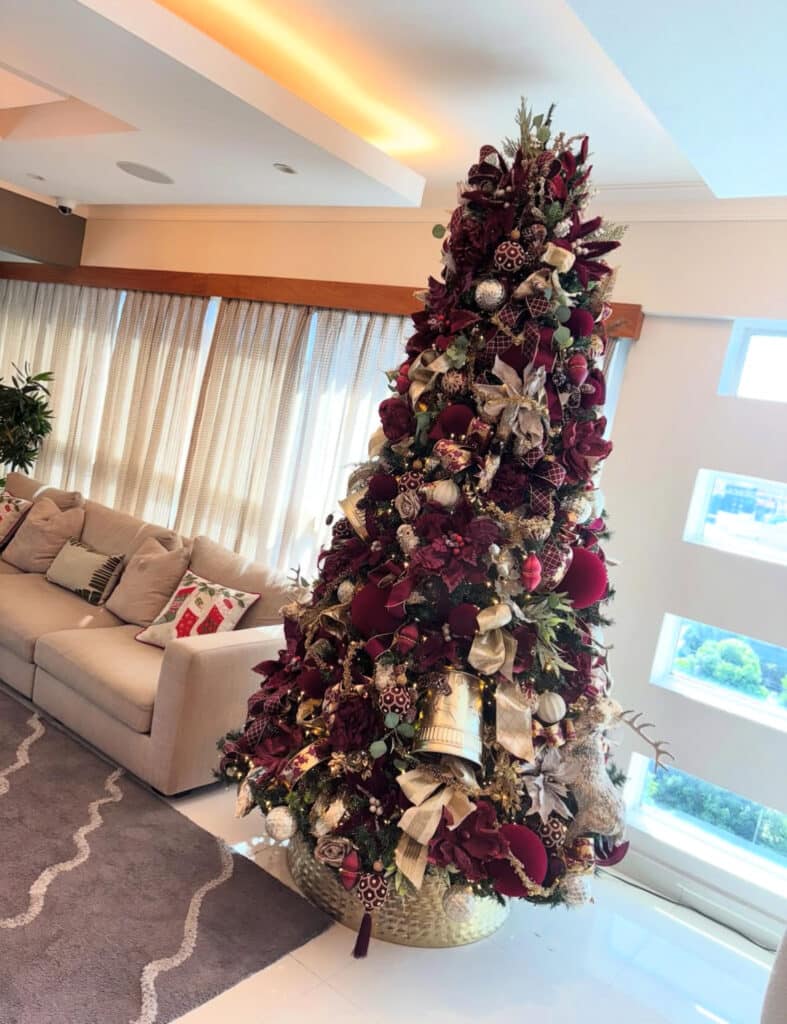 Layered luxe burgundy Christmas tree with rich textures