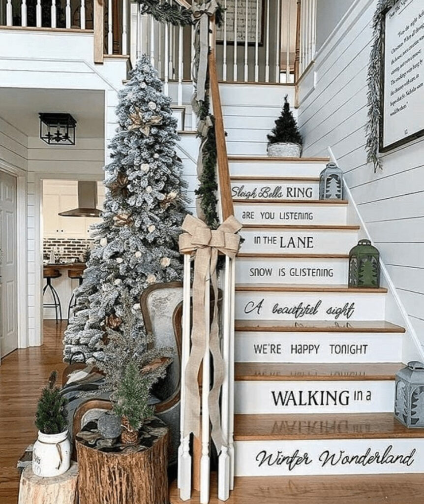 Christmas staircase decorated with lyric art and whimsical holiday accents
