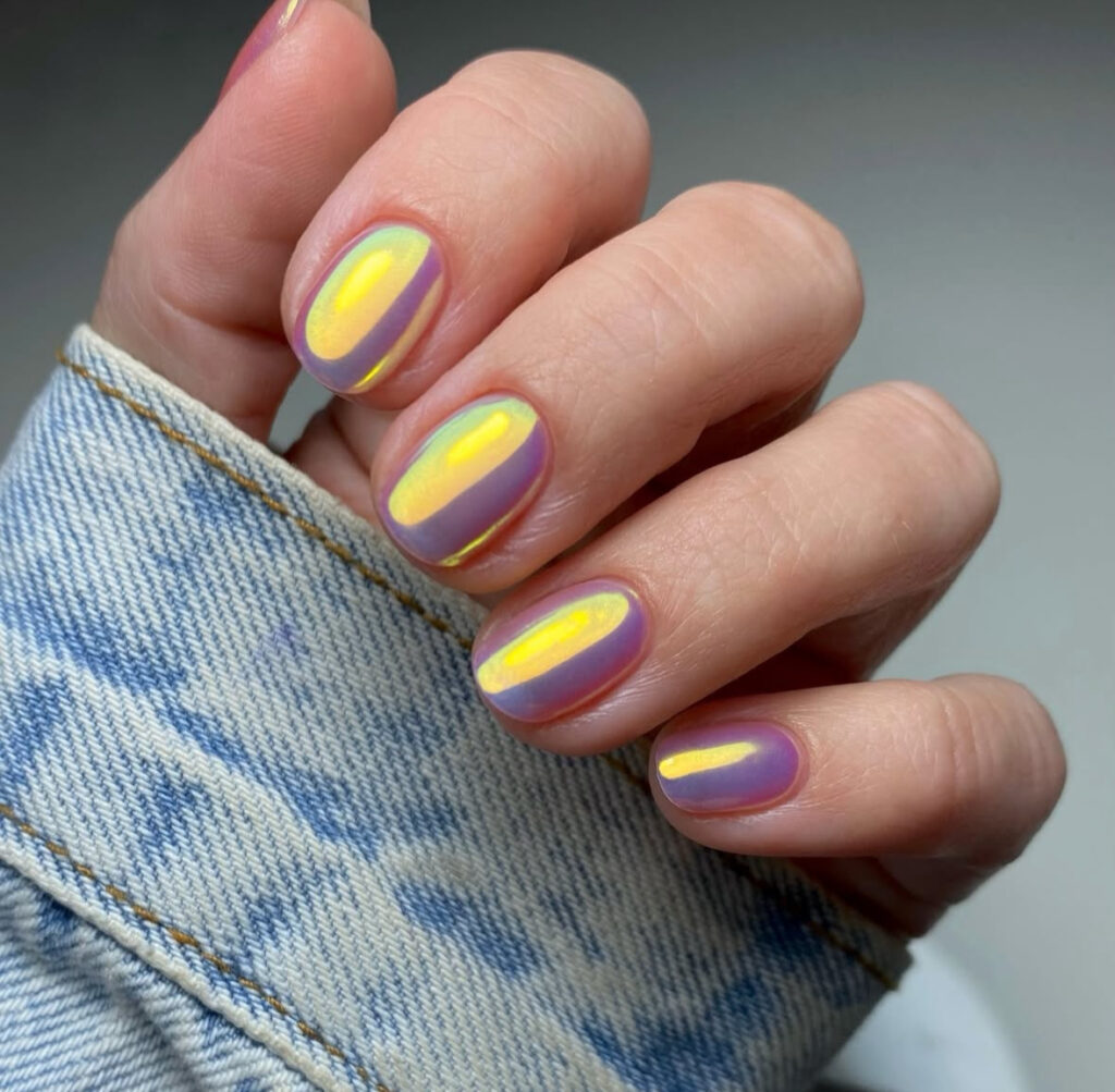 Midnight blue nails with gold leaf accents