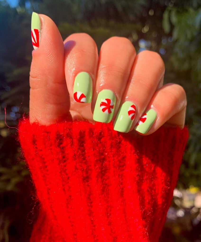 Mint and white peppermint pops nail design