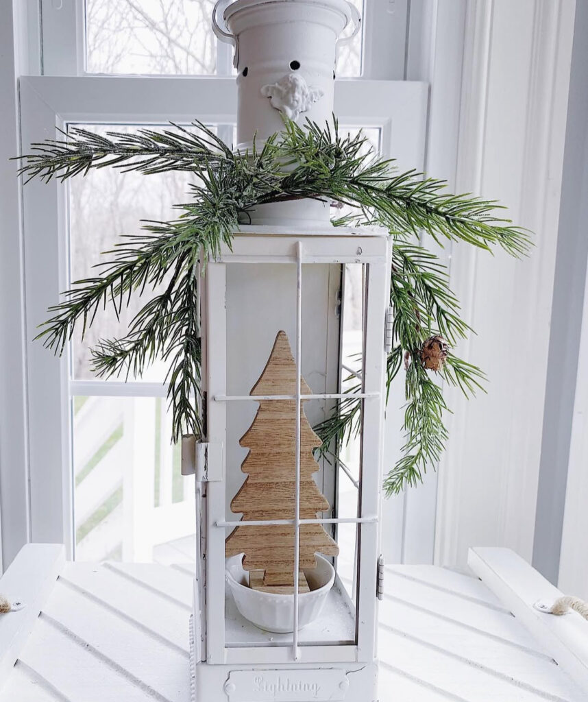 Minimal white wood lantern with Nordic holiday styling