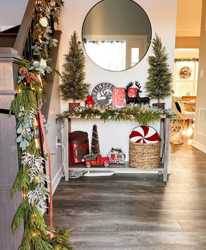 Peppermint themed console table decorated with woodland garland
