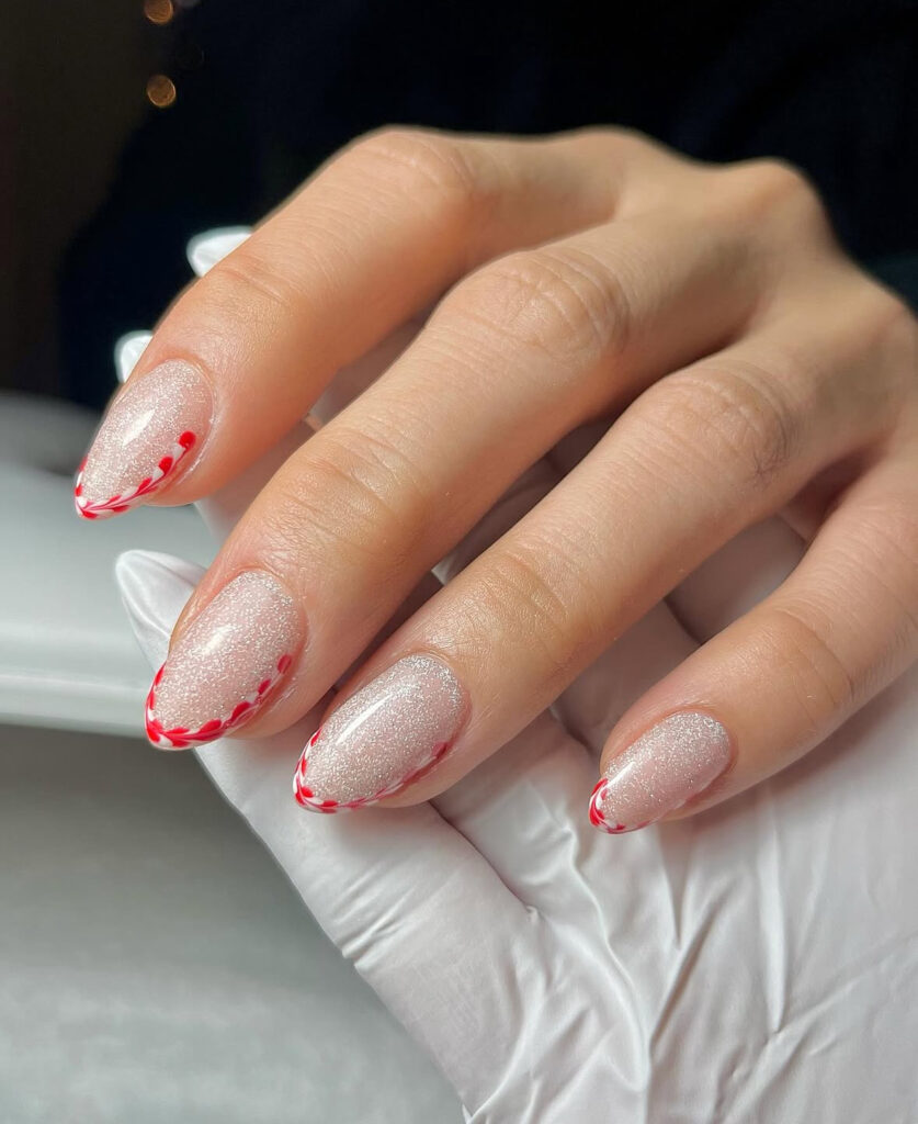 Shimmery whisper tip nails with subtle stripes