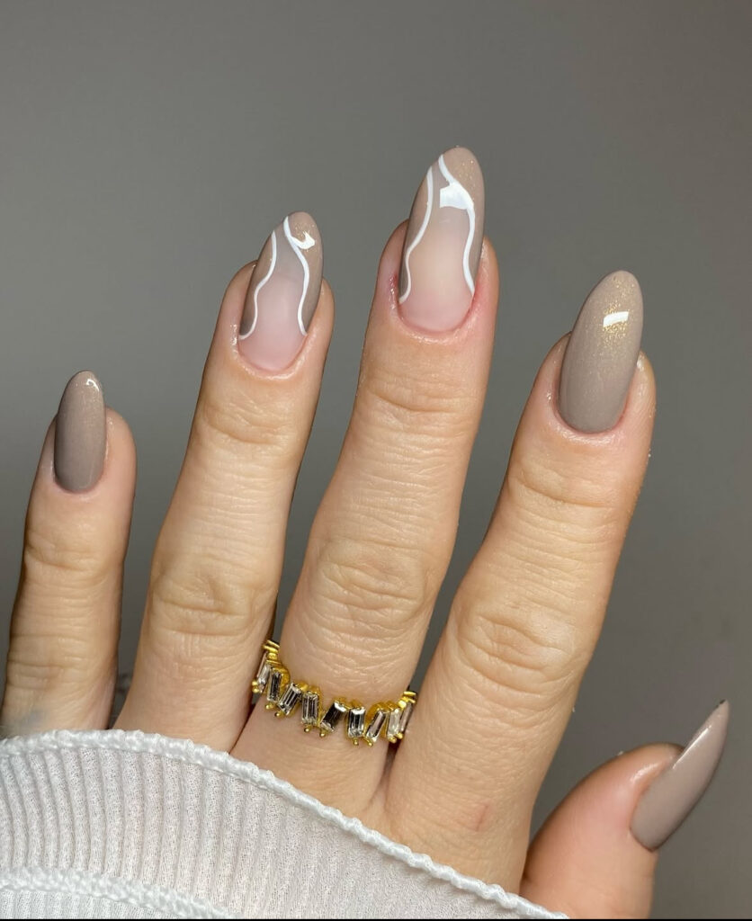 Taupe latte swirl nail design