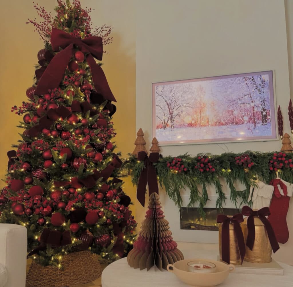 Burgundy Christmas tree with velvet ribbons and warm hearth glow