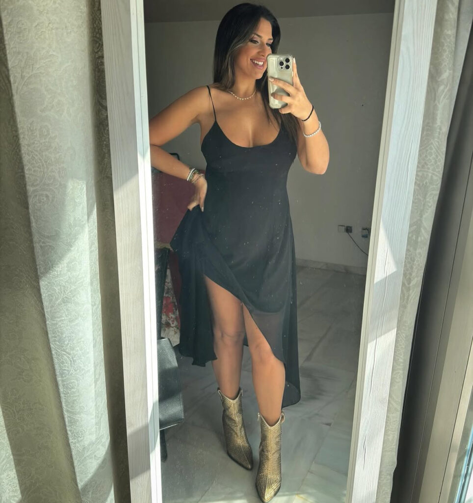 Black slip with asymmetric hem and gold cowboy boots; playful outfits for new years.