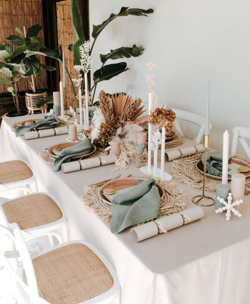 botanical tablescape with candles in boho chic Christmas decor