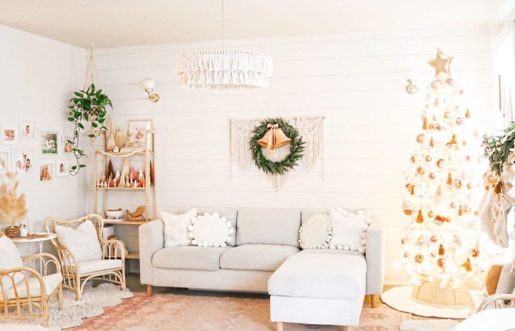 bright white living room with boho Christmas tree