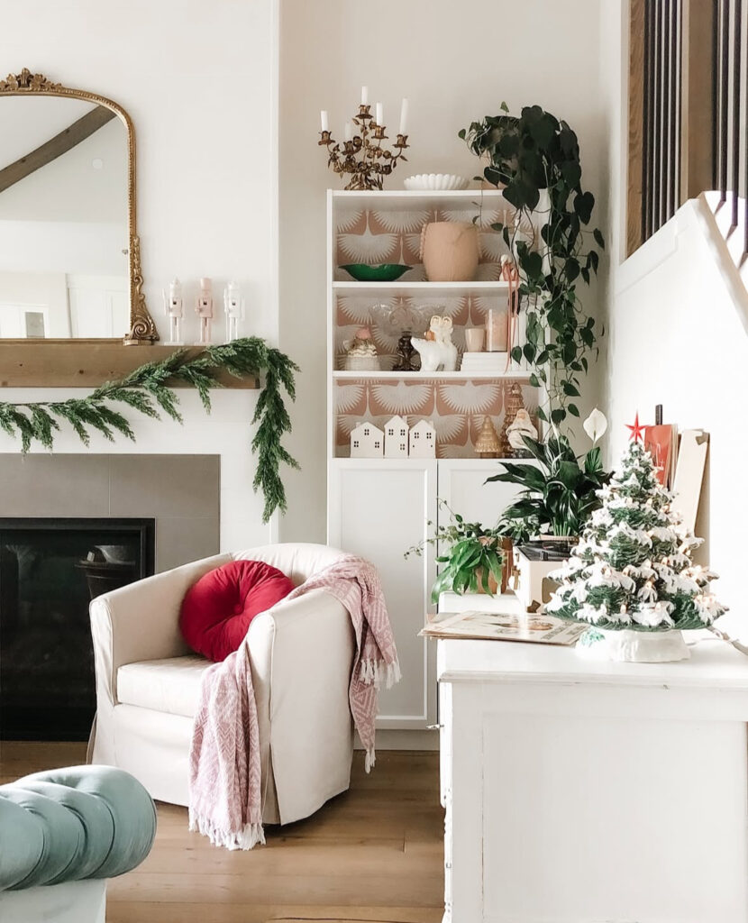 accent shelf with mirror and garland in colorful boho Christmas decor