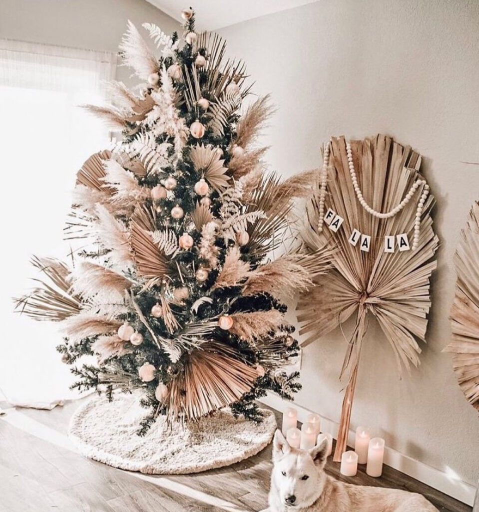 palm fans and pampas on a tall DIY boho Christmas tree