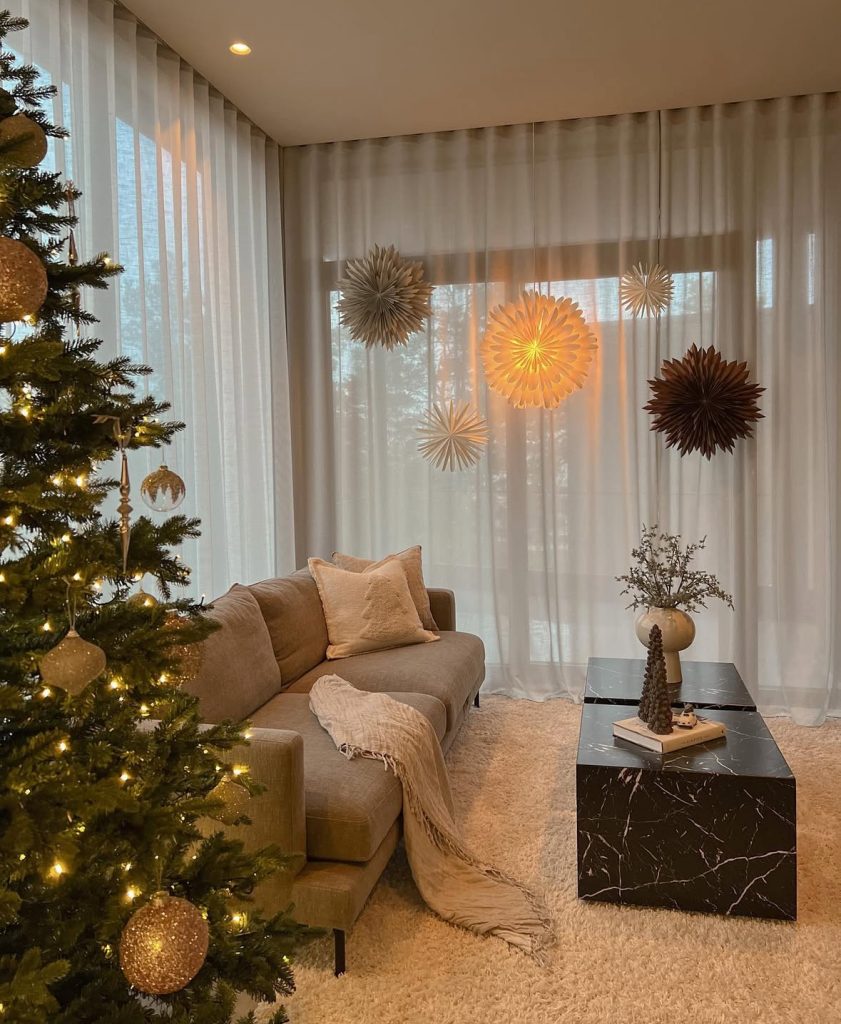 minimalist Christmas tree decorated with paper stars