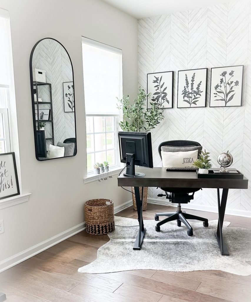 Modern farmhouse office with a chevron-pattern feature wall