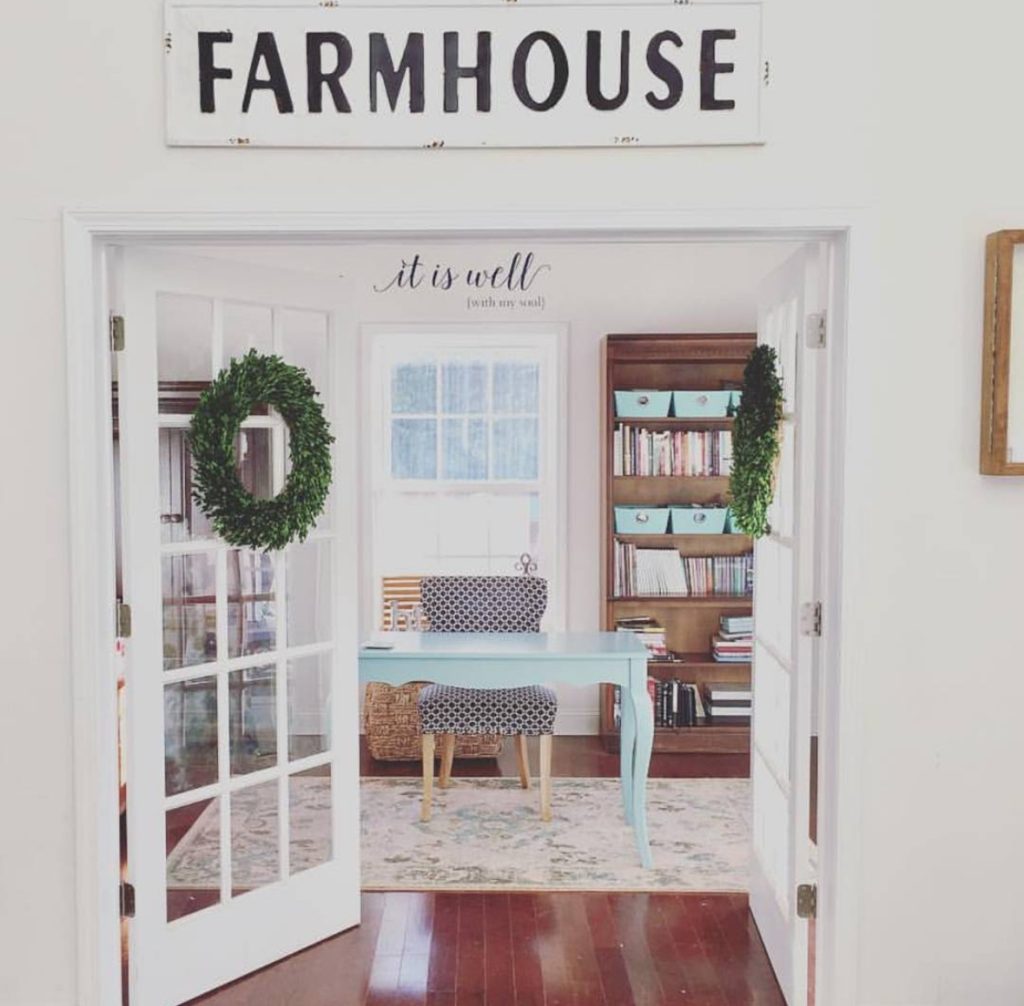 Modern farmhouse office with French doors and neutral furnishings