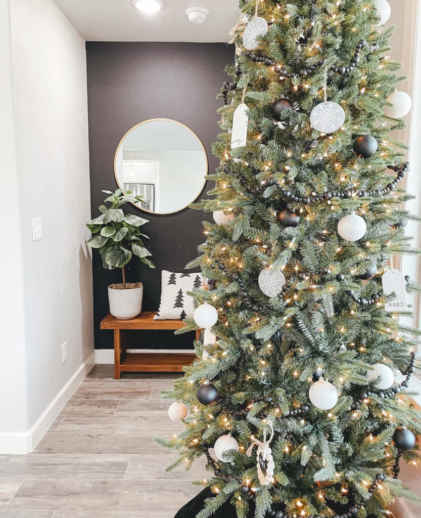 minimalist monochrome entry with Scandinavian Christmas decor