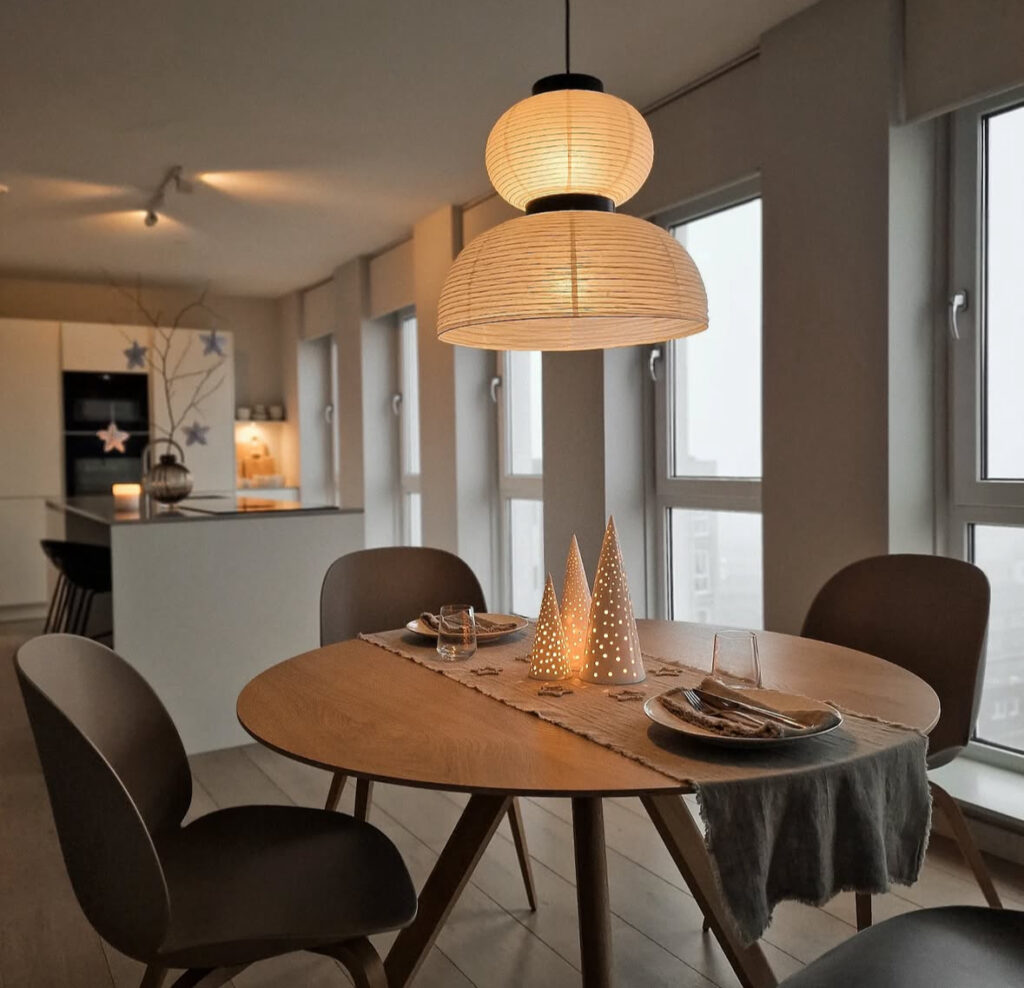 small Scandinavian dining table set for two at Christmas