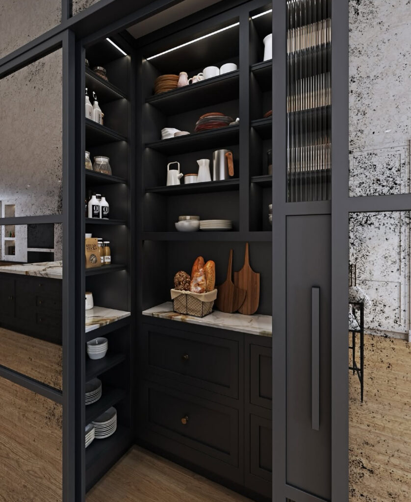 sleek black shelving and marble counter behind sliding glass create a dramatic walk in pantry cabinet packed with dishes and bread