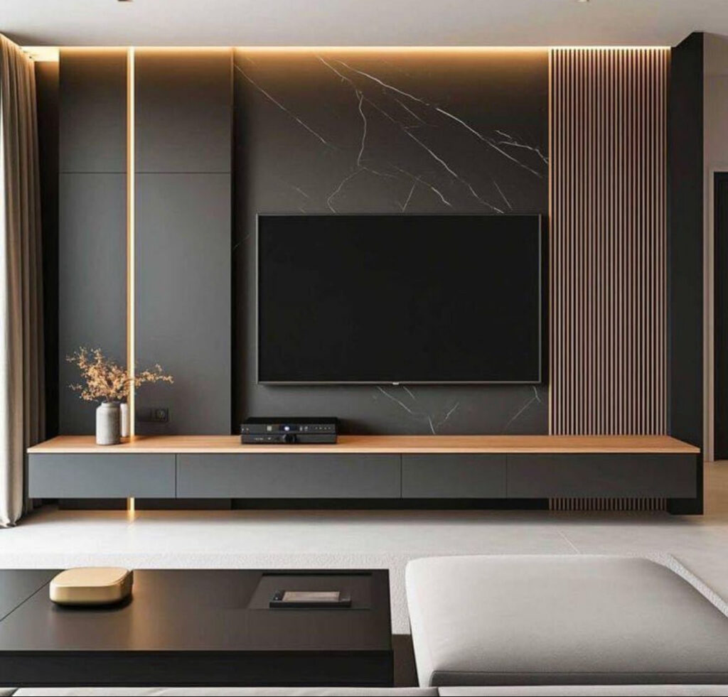 Dark stacked stone, vertical wood slats, and low floating unit forming a dramatic living room tv wall design with ambient lighting.
