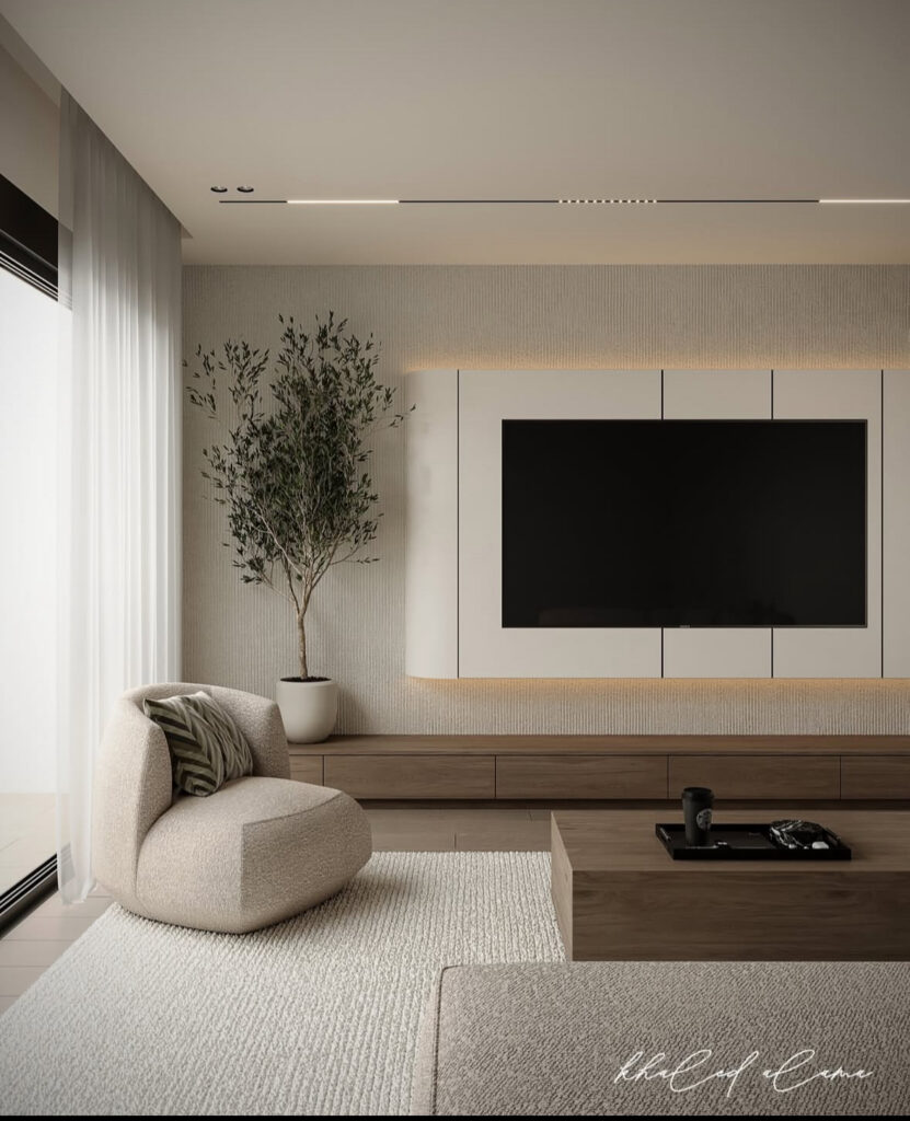 Framed screen above a slim console in a pale interior, perfect for saving to your living room tv wall decor ideas moodboard.