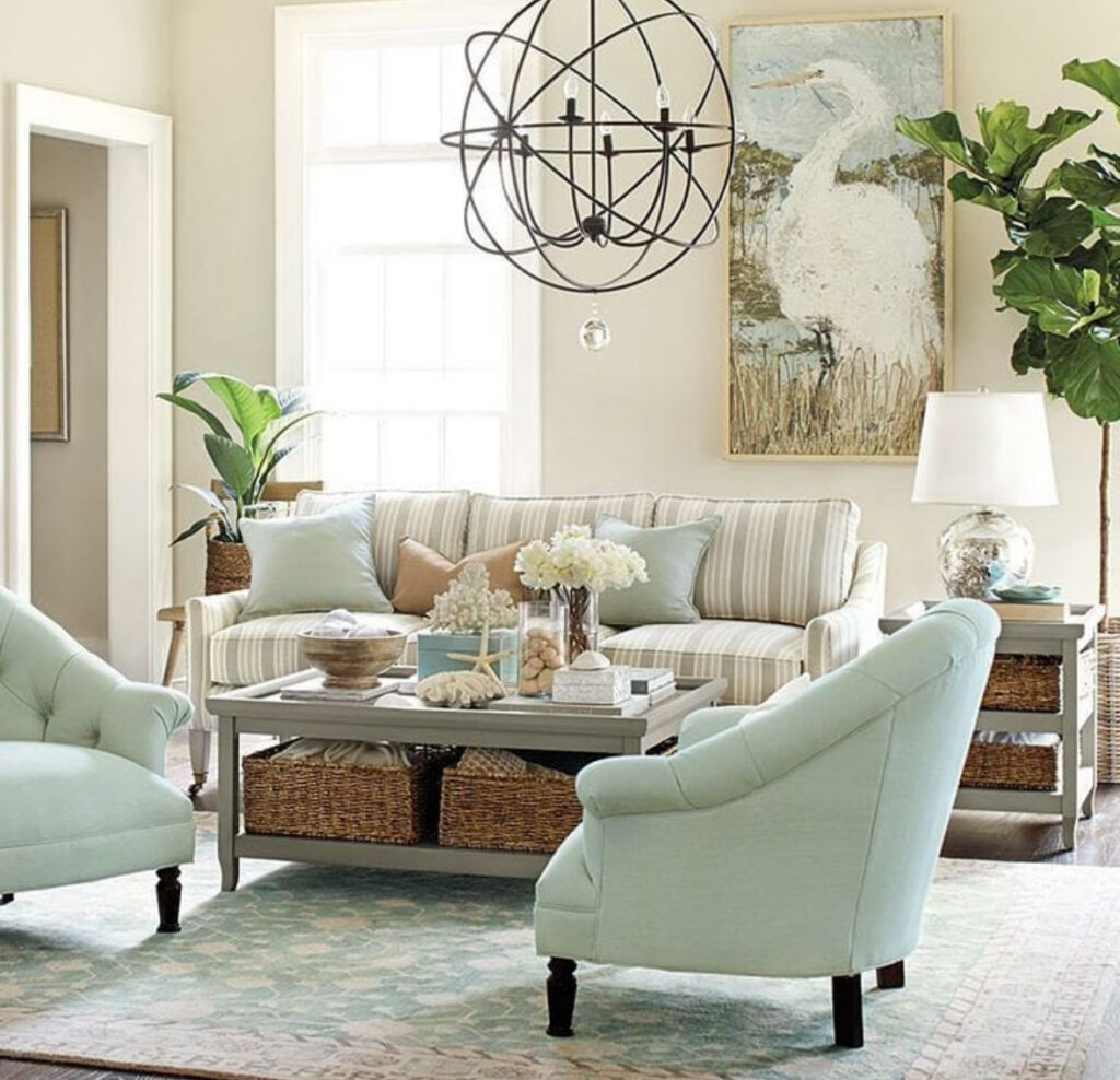 Pastel living room with striped sofa and mint armchairs inspiring shabby chic home decor ideas.