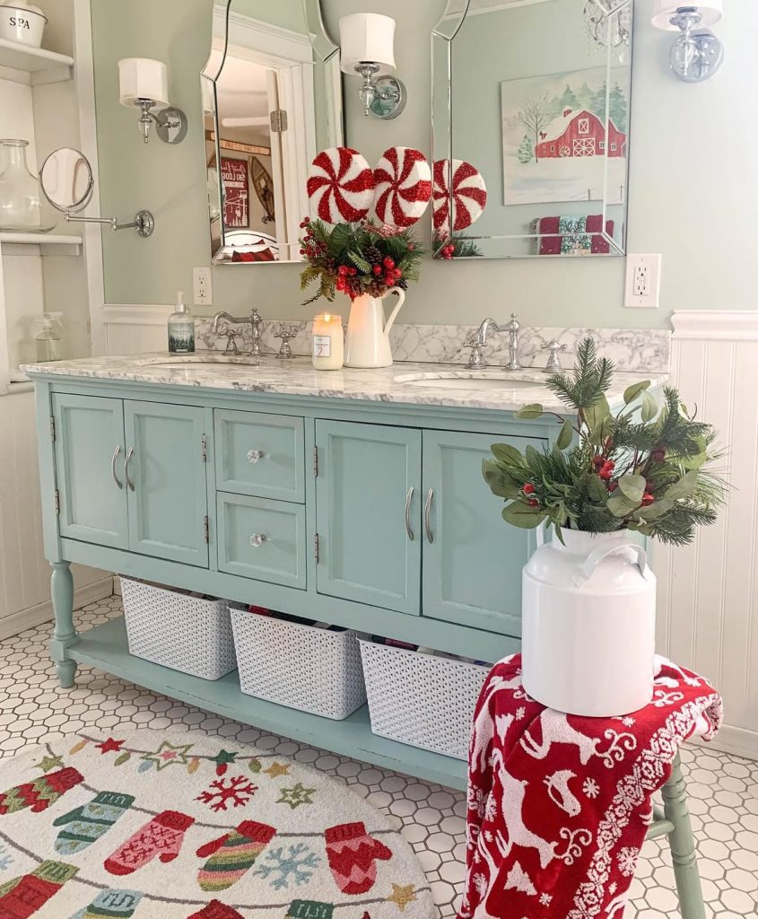 Mint-colored bathroom vanity decorated with peppermint Christmas accents