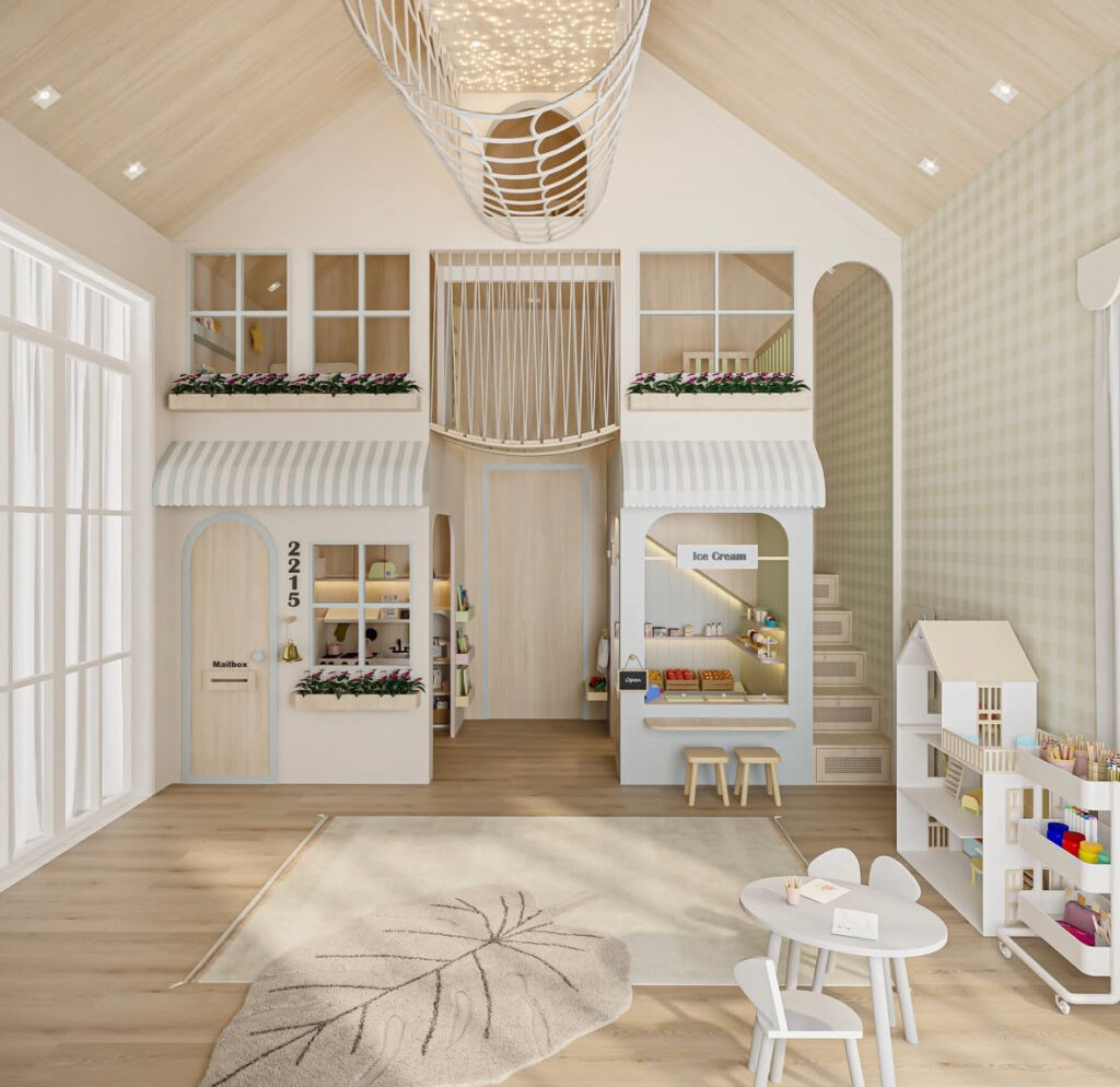 Bright playroom with two playhouse storefronts, striped awnings, a large rug, and a kids table that clearly defines reading, craft, and open-play zones.