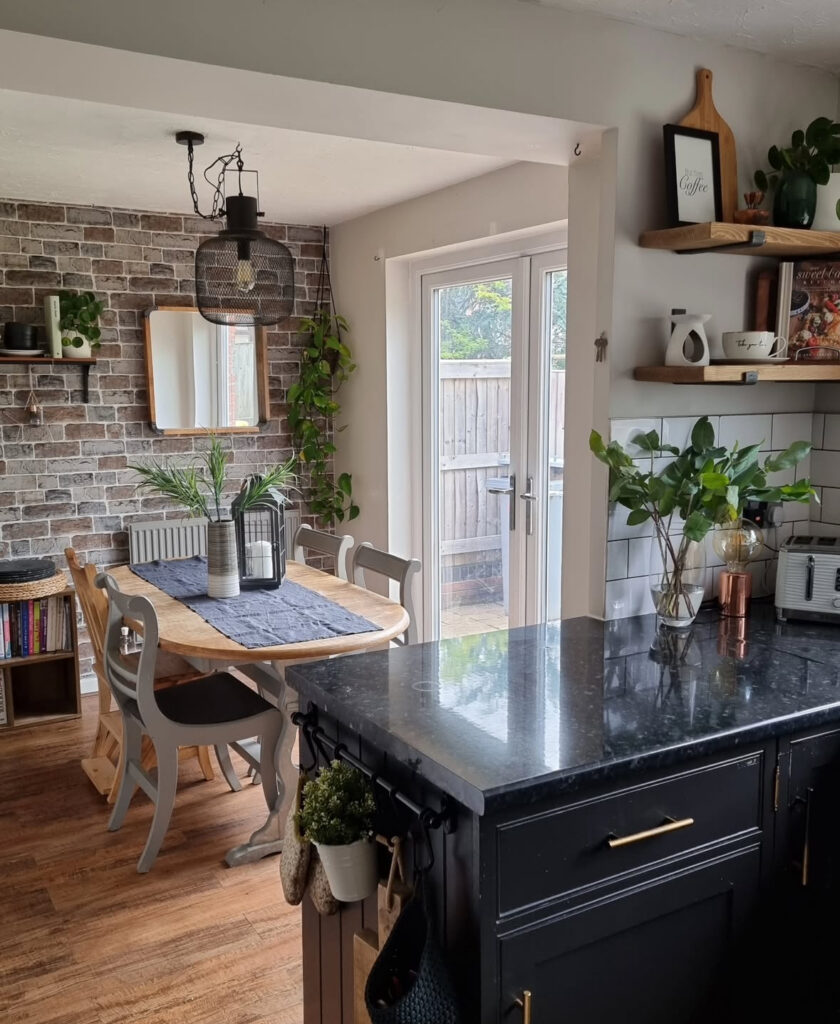 Simple family kitchen with standard cabinets and plain finishes before the layered modern country transformation by @pagesofemma.