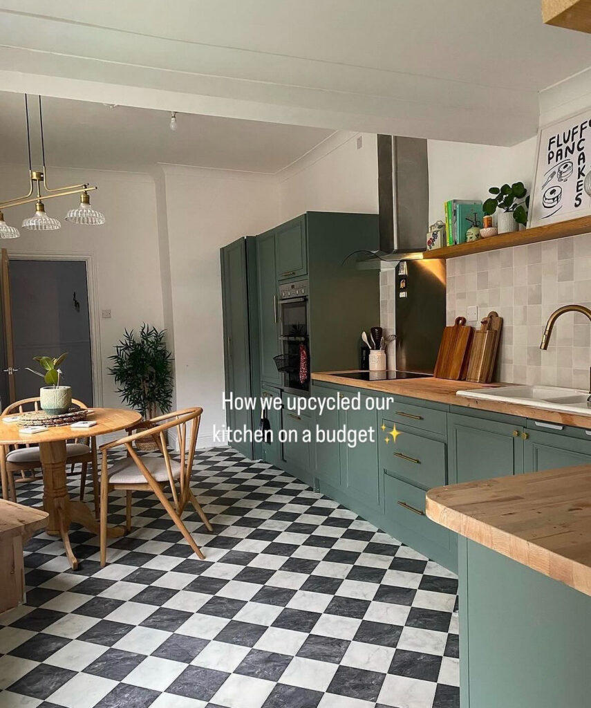 Deep green shaker kitchen with black-and-white checkered floor and warm wood counters creating a cosy, characterful space by @abbysathome.