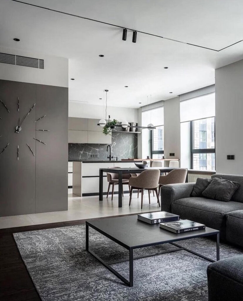 Living room with a neutral color palette and streamlined furniture for a serene look.