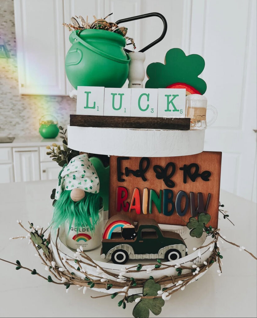 personalized st patricks decor on a tiered tray with “LUCK” blocks, rainbow details, clovers, and playful green accents.