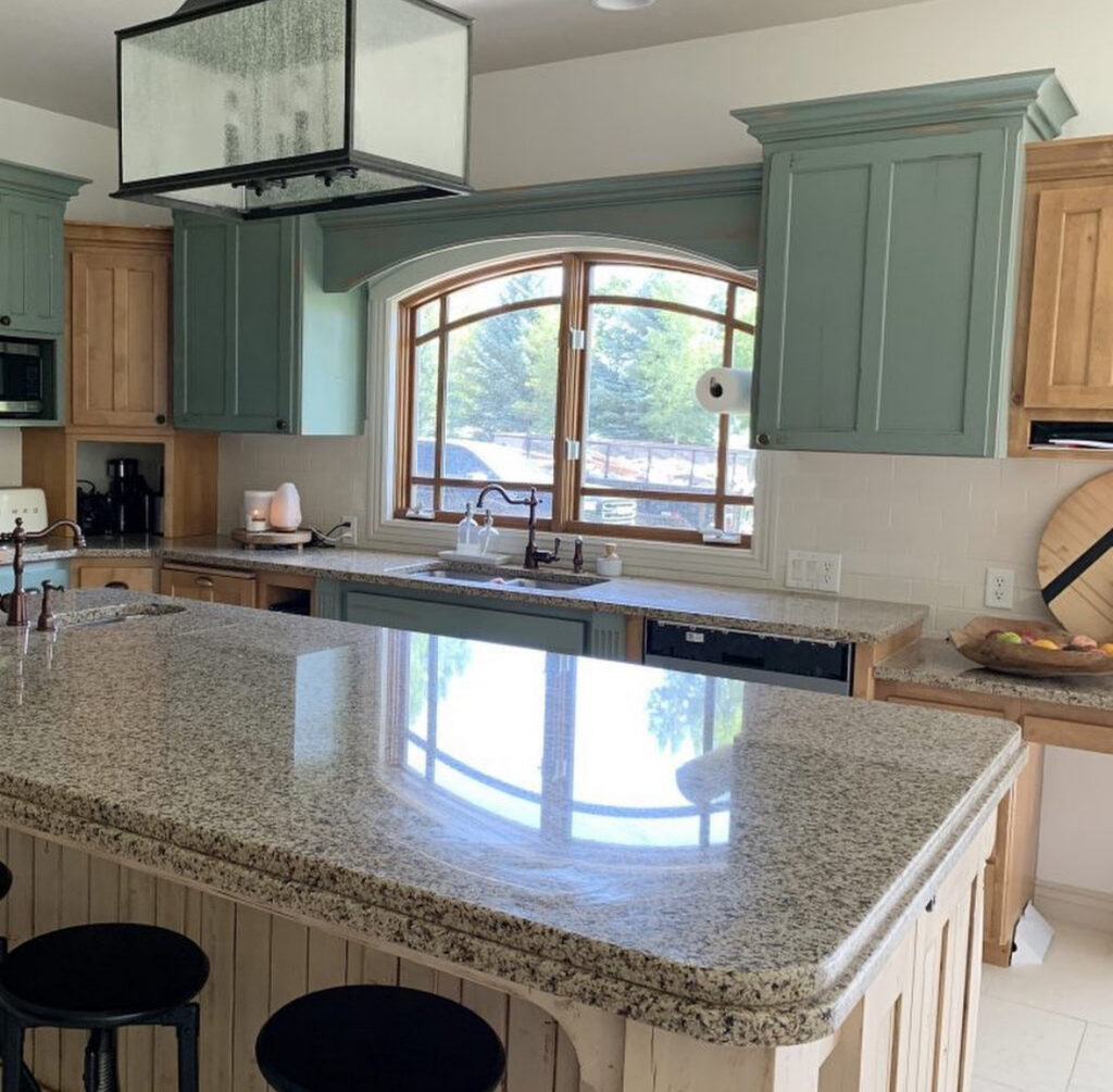 Cottage kitchen with mint uppers, wood accents and granite counters before the deeper modern cottage update by @chrislovesjulia.