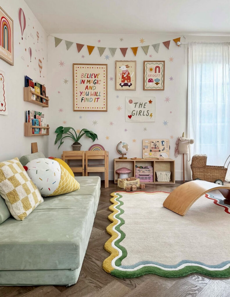 Whimsical playroom corner with star wall decals, bunting, and a scalloped rug defining a cozy zone.