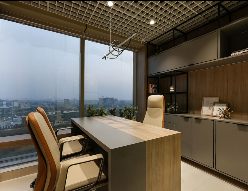 Professional office decor in an executive office with dark walnut wood panels, marble-textured shelves, sculptural lighting, and ergonomic office furniture in a warm, modern design.