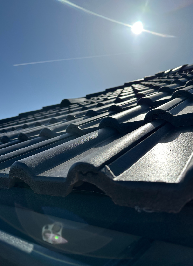 close up anthracite roof tiles gloss finish new build