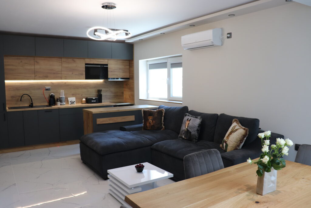 living room with tray ceiling