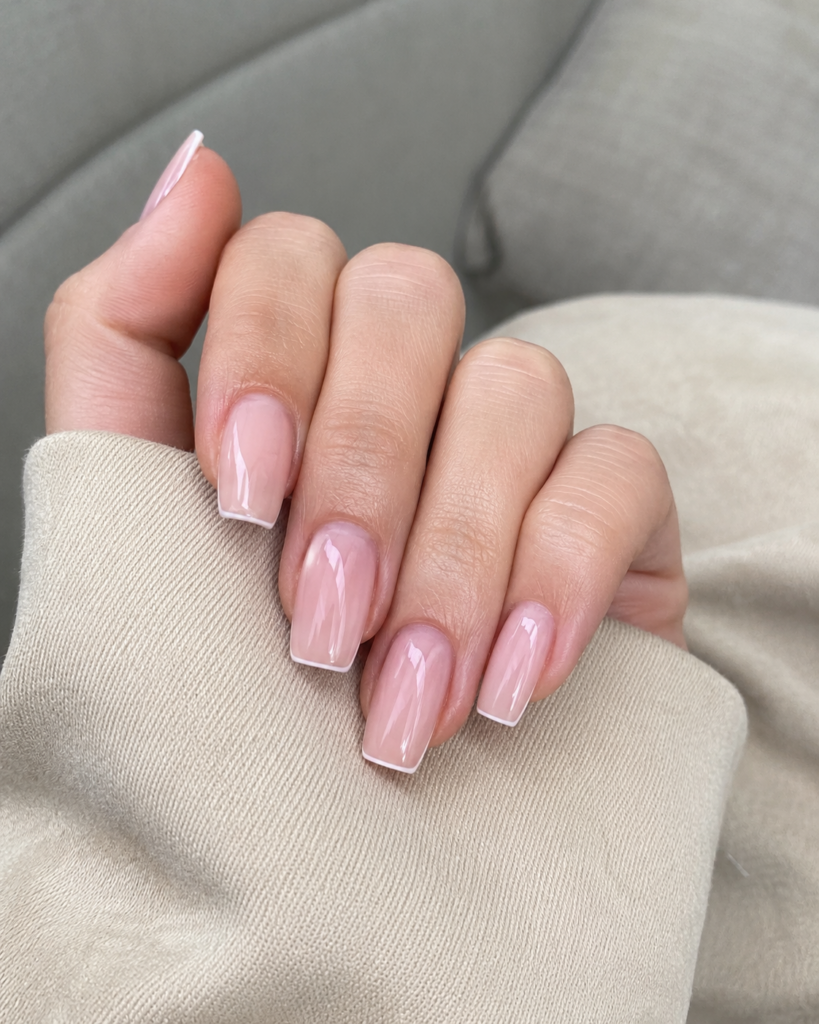 Ultra thin micro French tip line nails on coffin shaped gel manicure