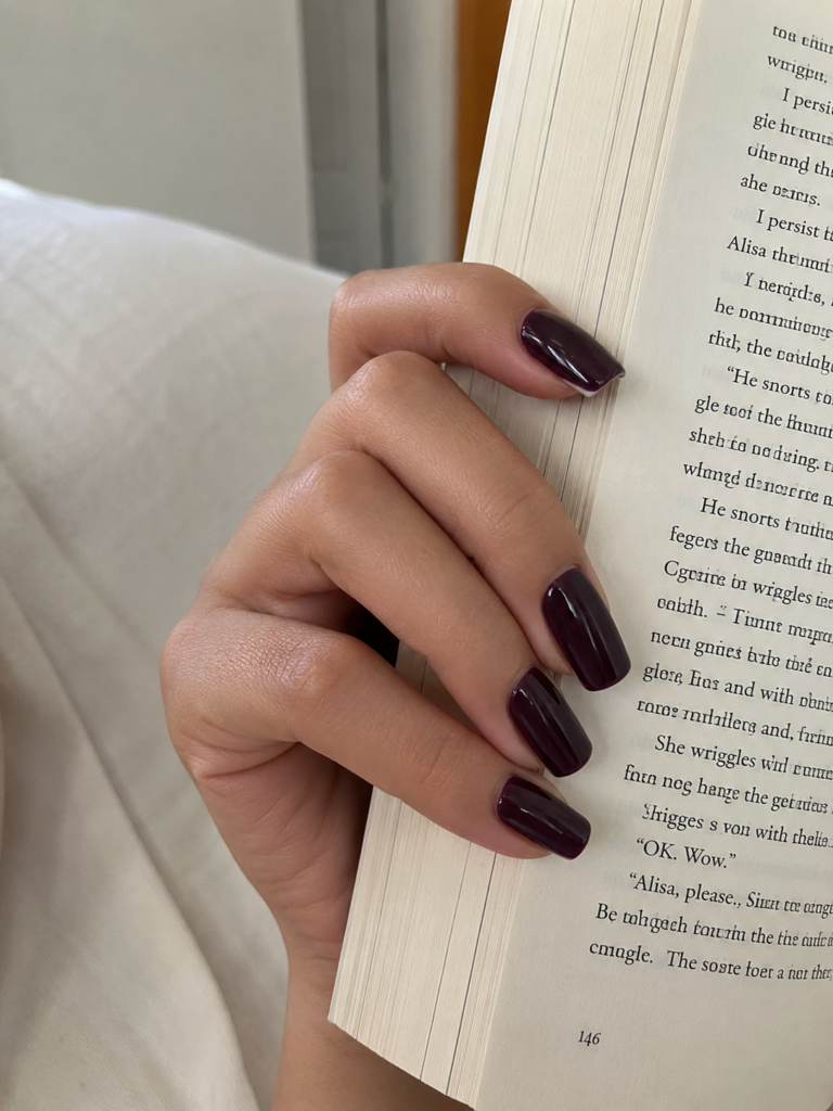Deep smoky plum nails on coffin shaped gel manicure