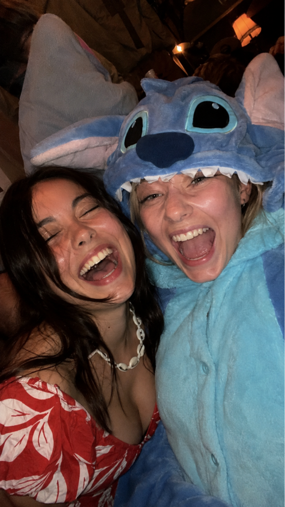 Two friends in a red Hawaiian dress and a fuzzy blue alien costume, Lilo and Stitch Disney Halloween costume