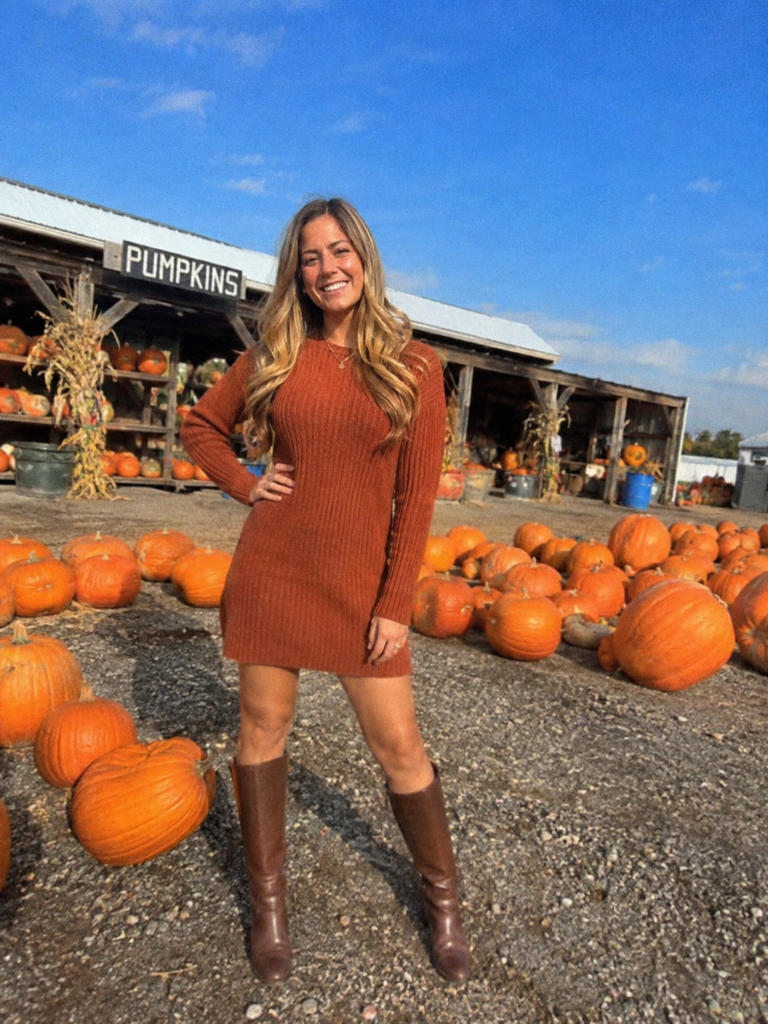 Rust sweater dress and knee-high boots pumpkin patch outfit